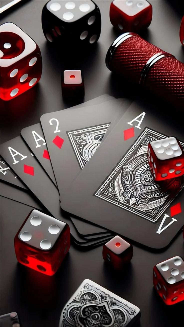 Poker table with stacked playing cards, dice, and a card shuffler
